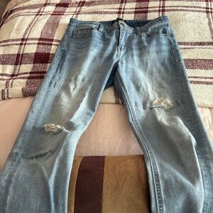 Kenneth Cole distressed skinny jeans